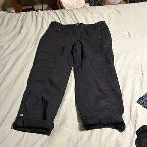 Black Chico’s pants , front pocket , back is mock pocket .